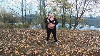 A Stunning Milf Flaunts Her Curves In Public Park By Lake