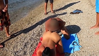 A Gangbang With An Amateur Milf On The Beach With A Close-Up View Of The Action.